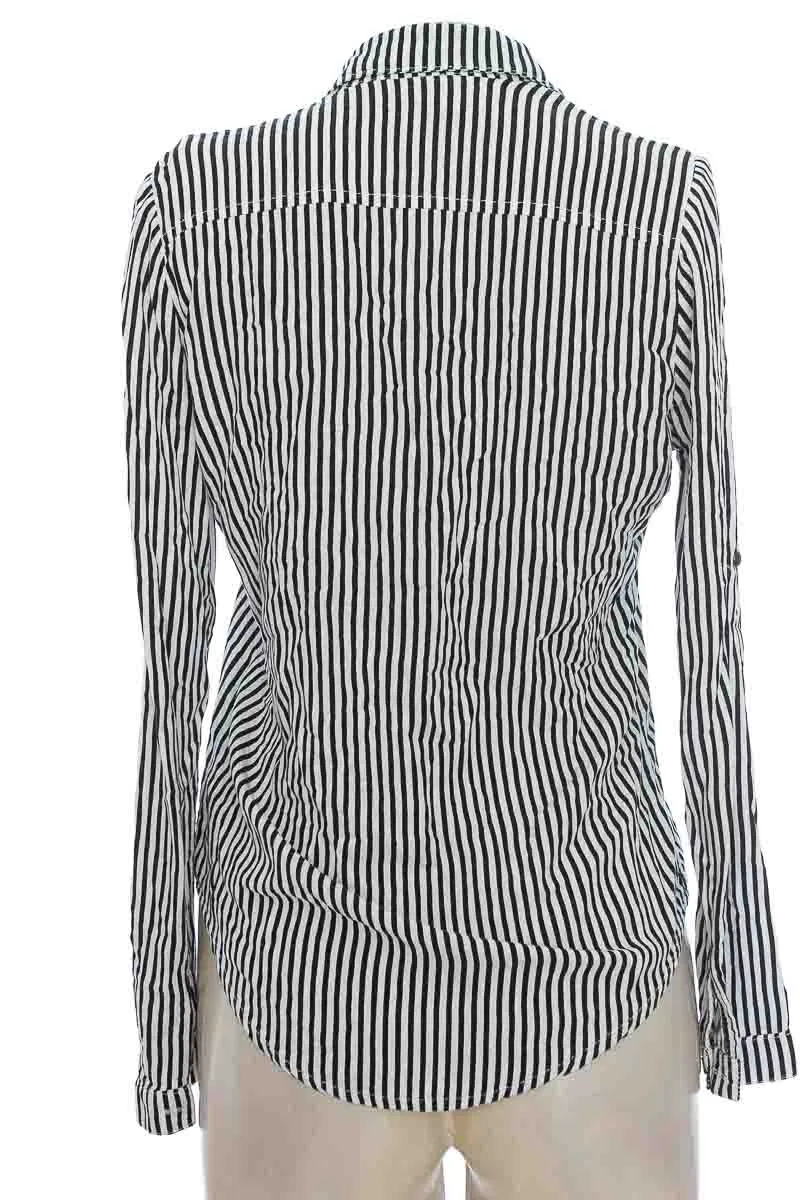 BLUSA COLOR NEGRO  OKI