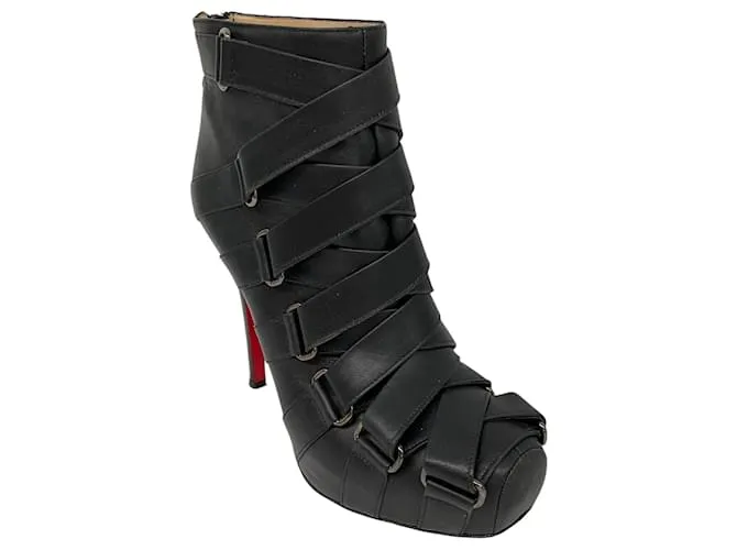 Botines de cuero de tacón alto con detalles de correa Christian Louboutin Negro 