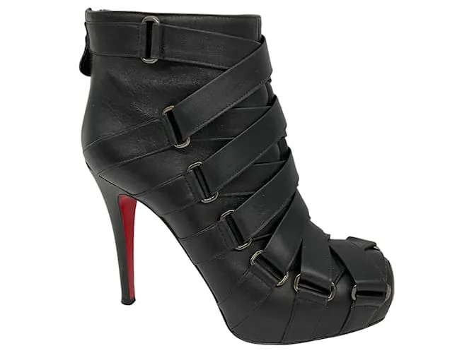 Botines de cuero de tacón alto con detalles de correa Christian Louboutin Negro 