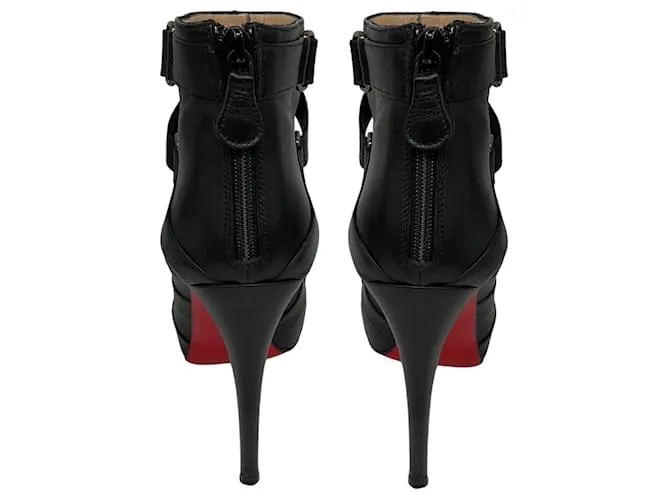 Botines de cuero de tacón alto con detalles de correa Christian Louboutin Negro 