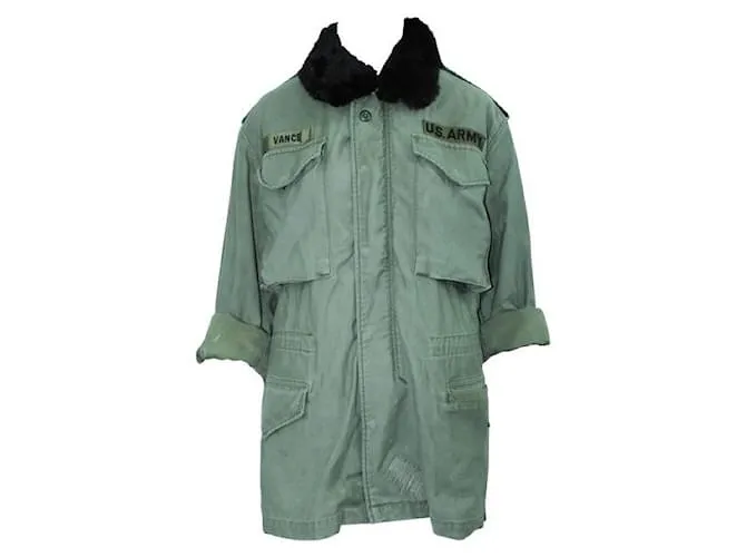 Chaqueta de invierno verde oscuro con piel de Reformation 