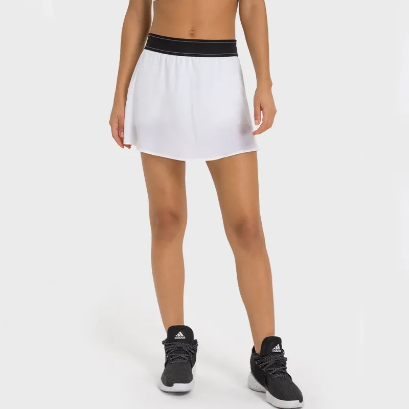 Faleta de yoga Punto de juego Falda de tenis anti resplandor mini falda universitaria secado rápido deportes transpirables panta