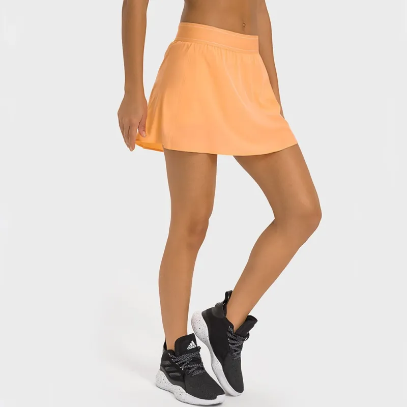 Faleta de yoga Punto de juego Falda de tenis anti resplandor mini falda universitaria secado rápido deportes transpirables panta