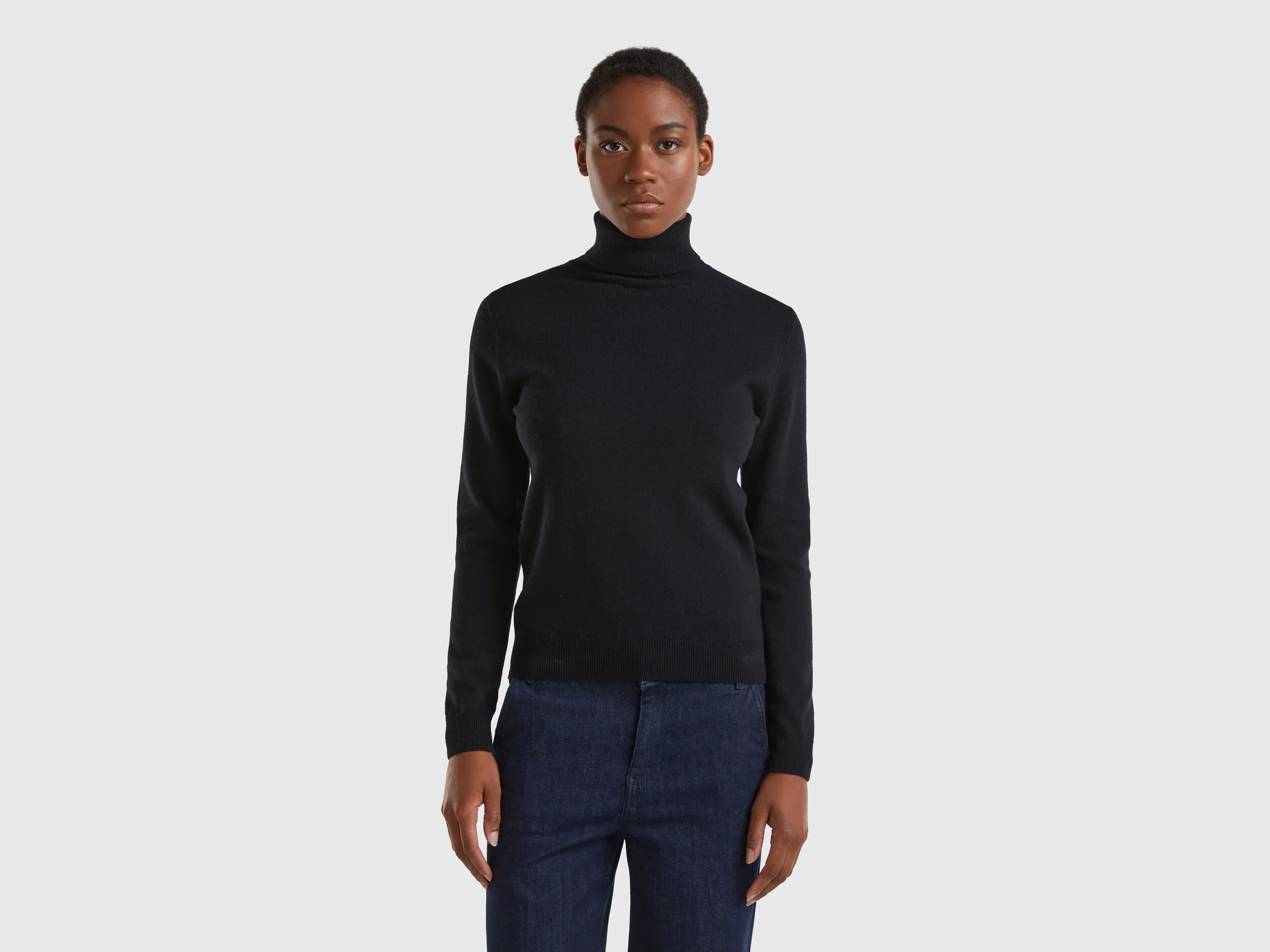 Jersey de cuello cisne negro de pura lana Merina