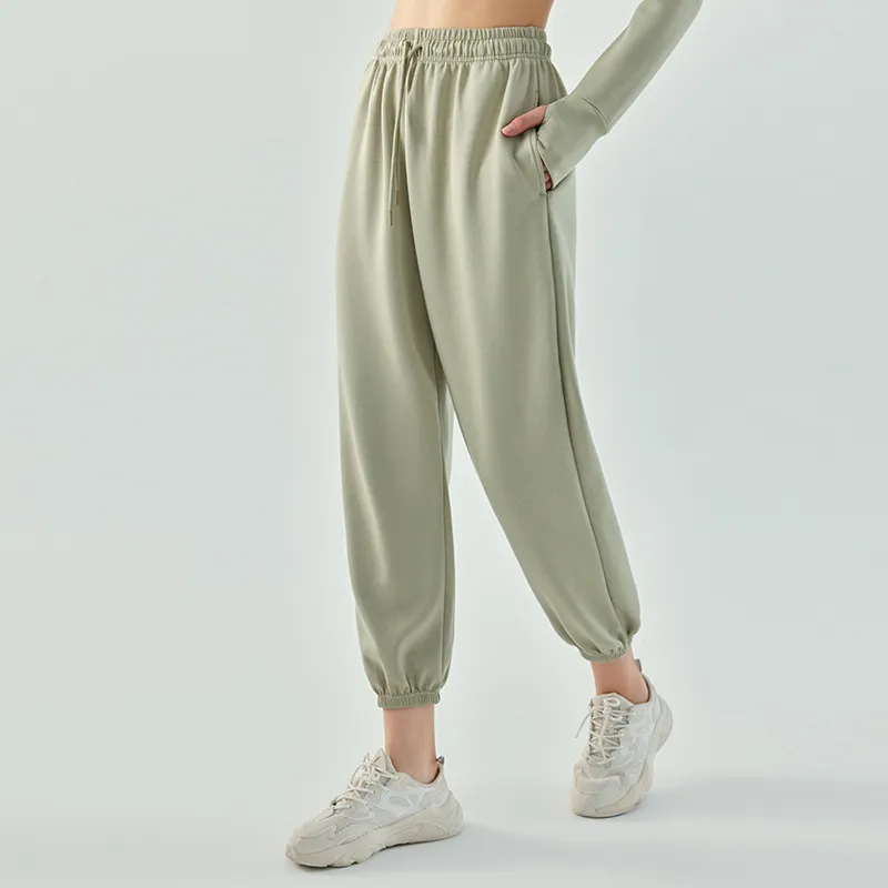 L661 Pantalones deportivos casuales sueltos de mujeres Pantalones de chándal de piernas ancho