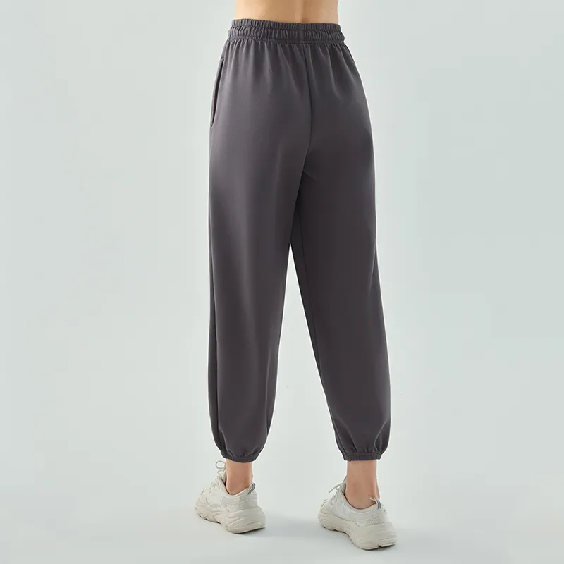 L661 Pantalones deportivos casuales sueltos de mujeres Pantalones de chándal de piernas ancho