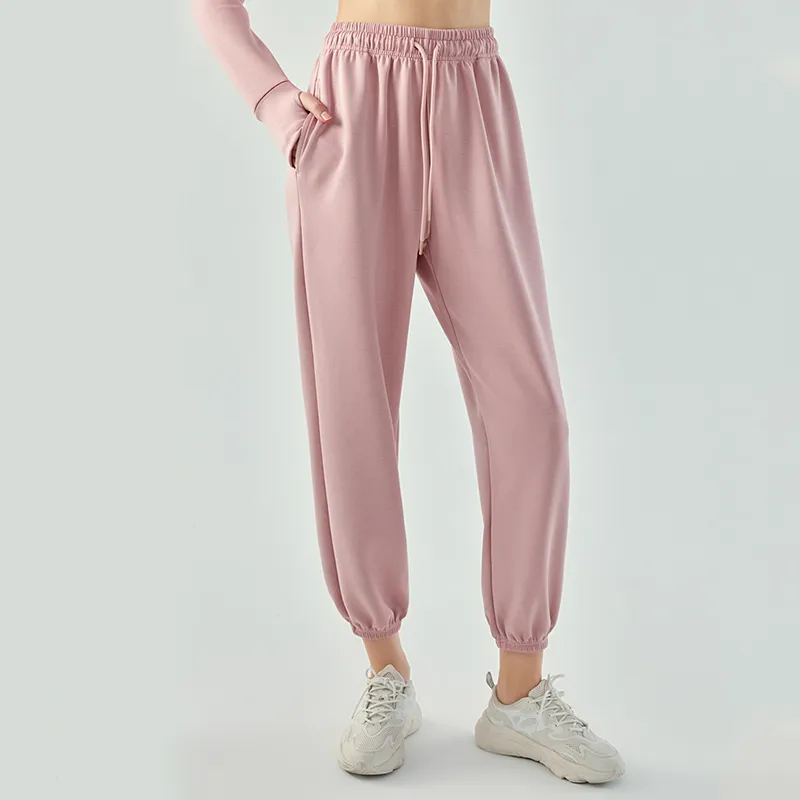 L661 Pantalones deportivos casuales sueltos de mujeres Pantalones de chándal de piernas ancho