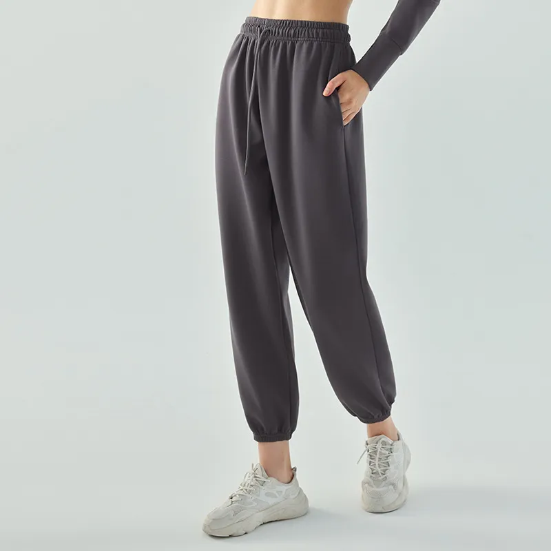 L661 Pantalones deportivos casuales sueltos de mujeres Pantalones de chándal de piernas ancho