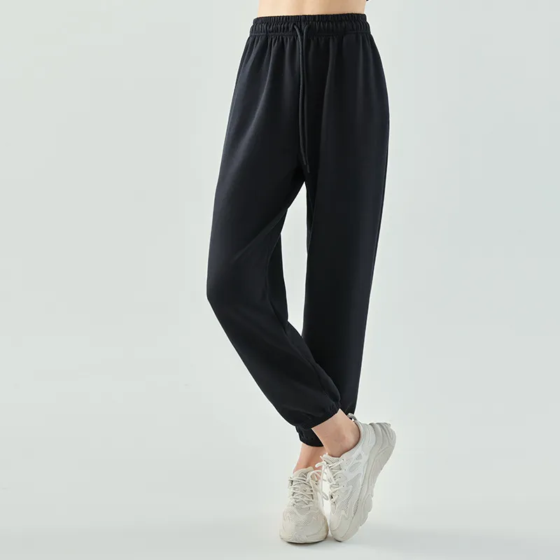 L661 Pantalones deportivos casuales sueltos de mujeres Pantalones de chándal de piernas ancho