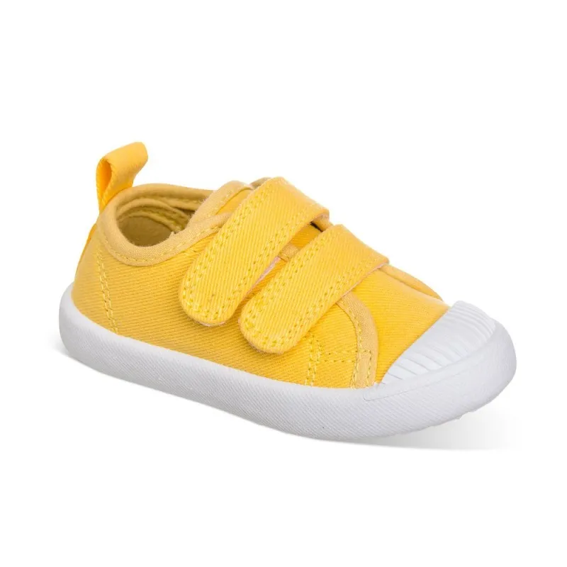 Lona color amarillo, fácil de combinar, con dos Velcros, puntera de goma y gran flexibilidad