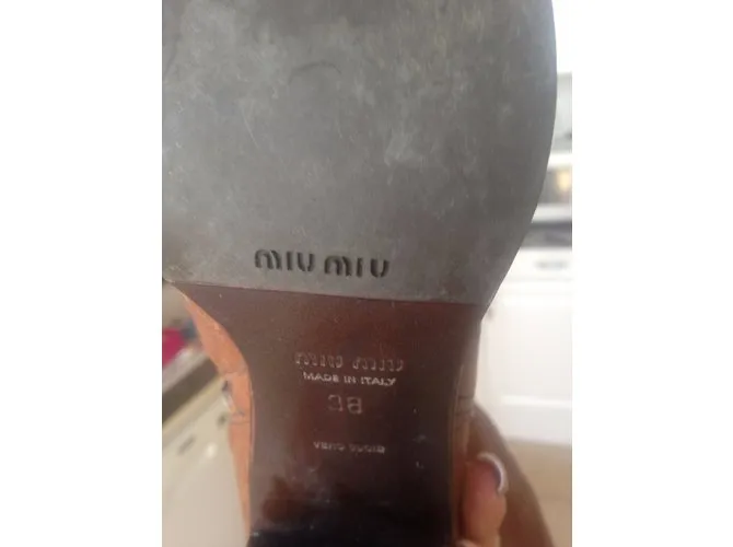 Miu Miu Botas altas altas Castaño 