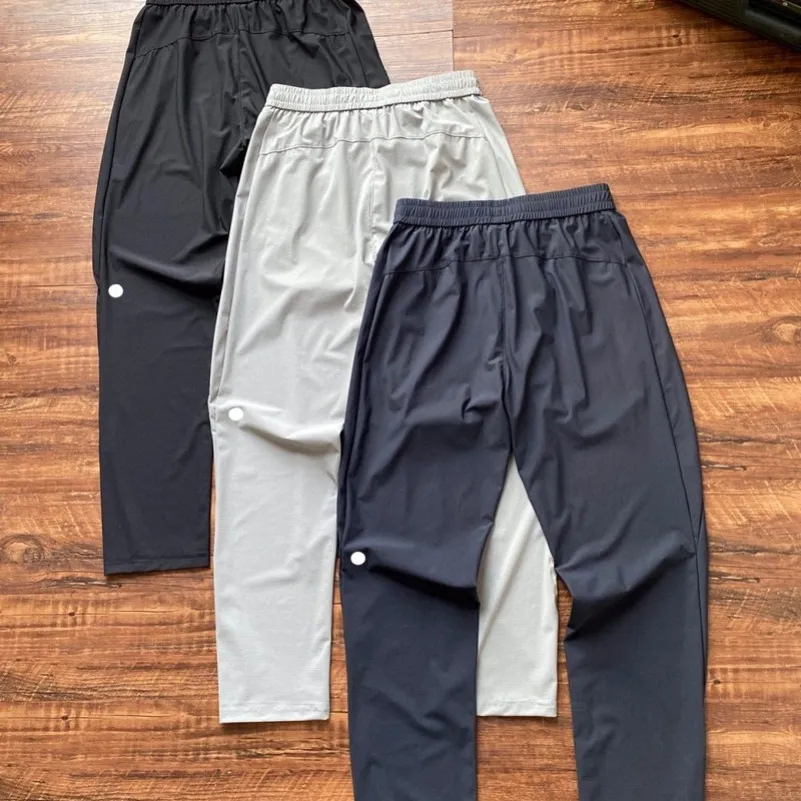 MN169 Men jogger pantalones largos deportes atuendo de yoga bolsas de gimnasia pantalones de chándal pantalones para hombres par