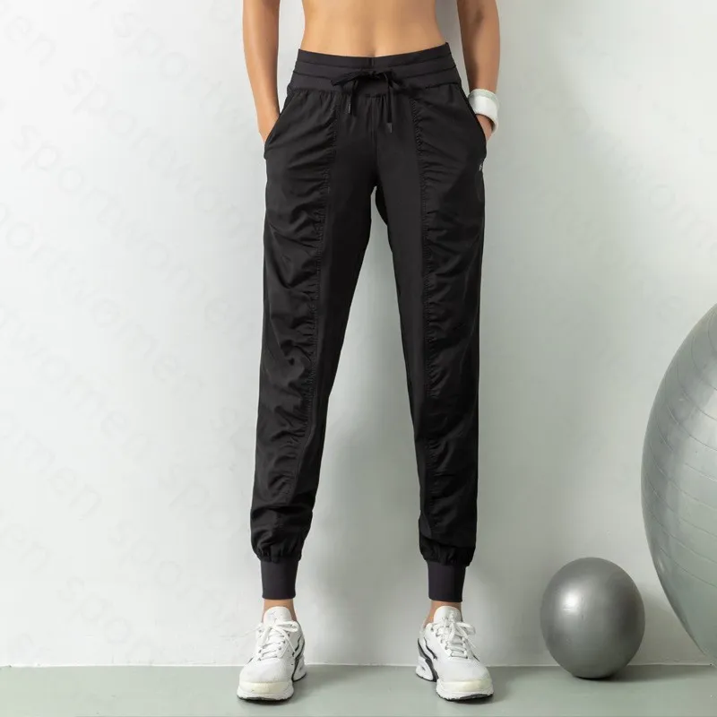 Pantalones de chándal tela shing running sport joggers mujeres fitness de gimnasio atlético seco rápido con dos bolsillos latera