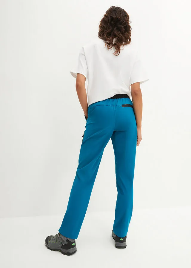Pantalón elástico en 4 direcciones con material impermeable y bolsillos turquesa profundo
