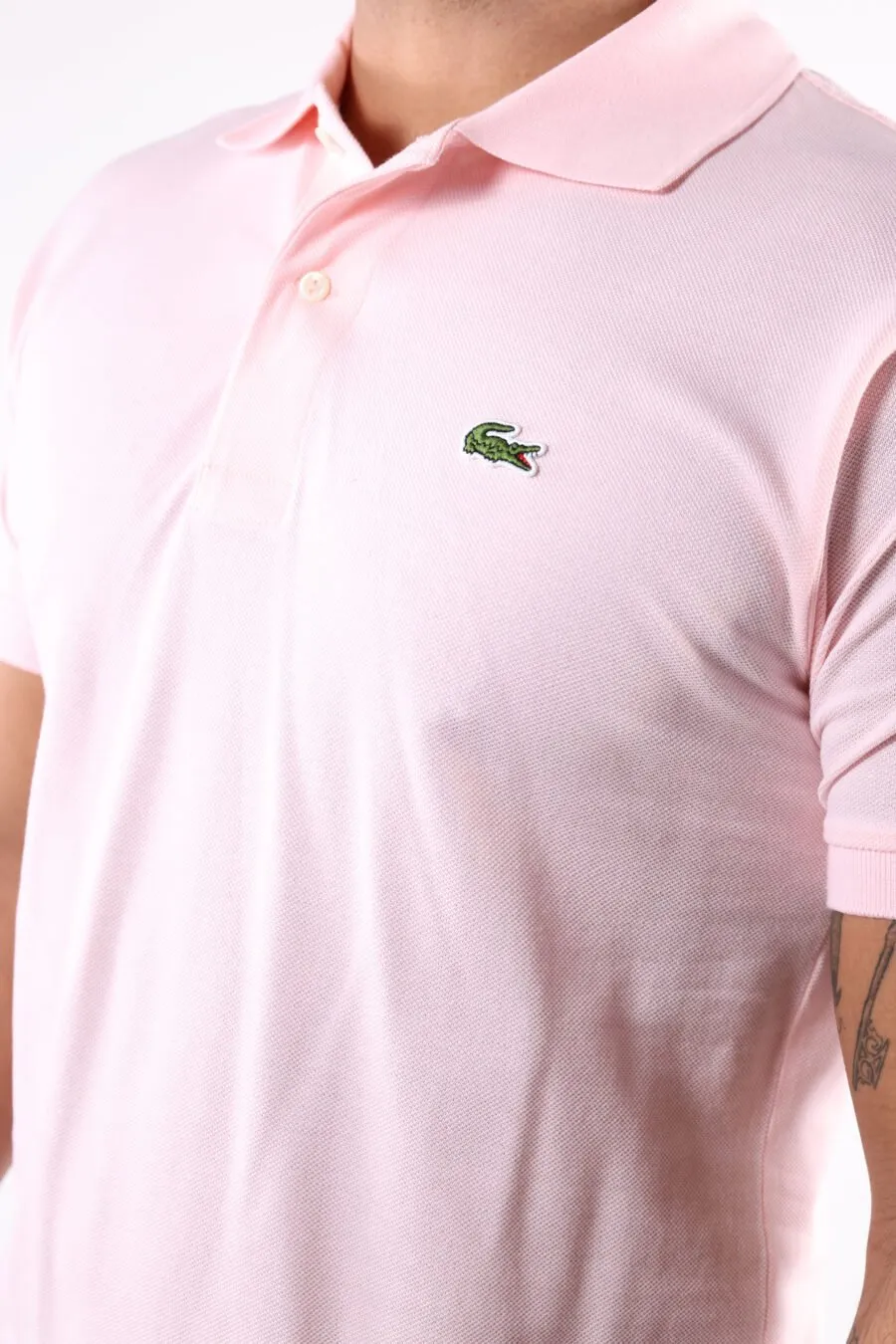 Polo rosa con minilogo 