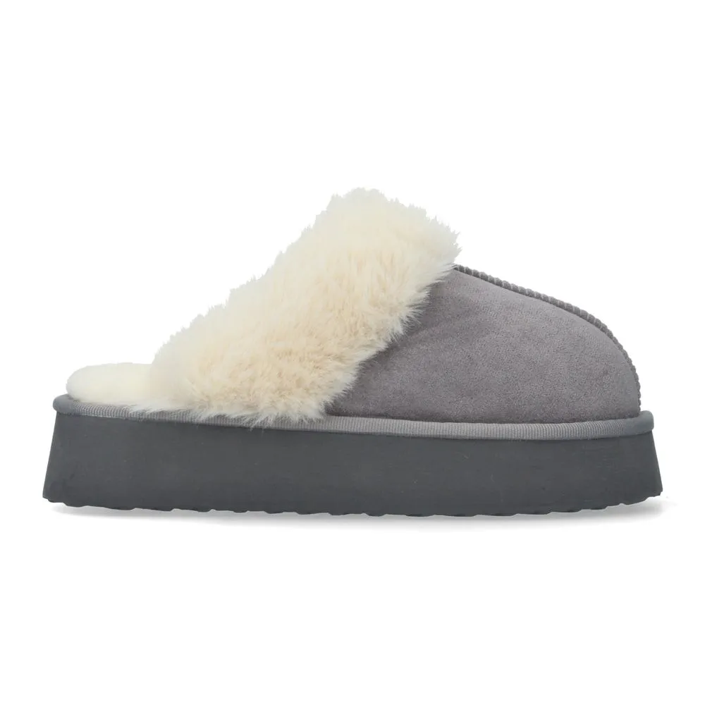 Zapatilla de casa estilo australiano cálidas forradas de pelo de plataforma y puntera redonda.